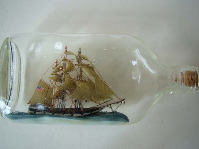 A very fine and attractive Three-Masted Ship-in-a Bottle